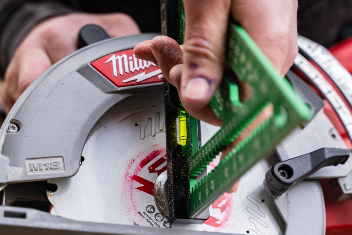 SquiJig Fusion Pro 7.5-in. rafter square marking a cut line on a board
